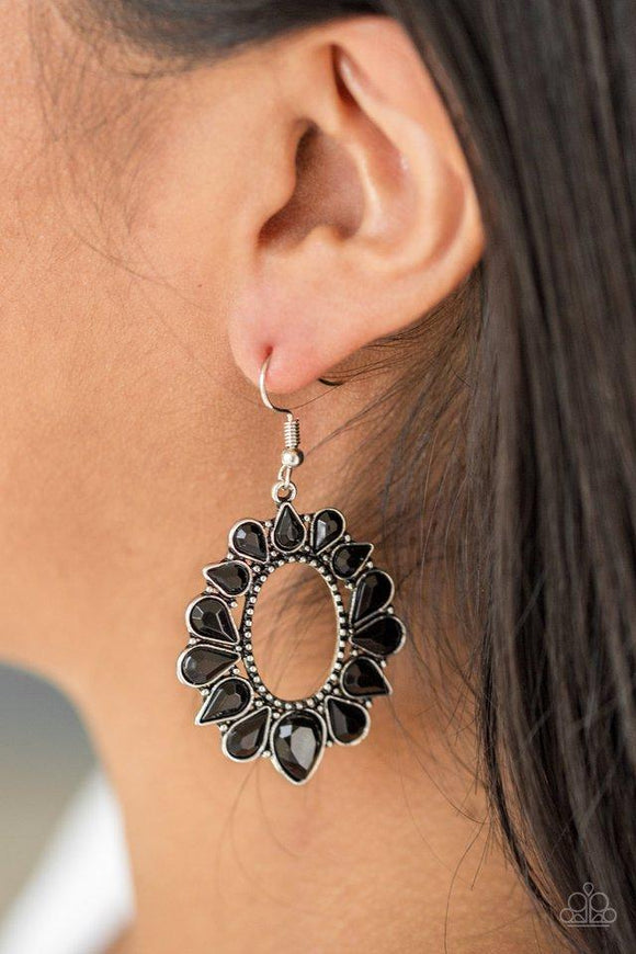 Paparazzi Fashionista Flavor - Black Faceted black teardrops flare from a studded silver hoop, coalescing into a flirty frame. Earring attaches to a standard fishhook fitting.

