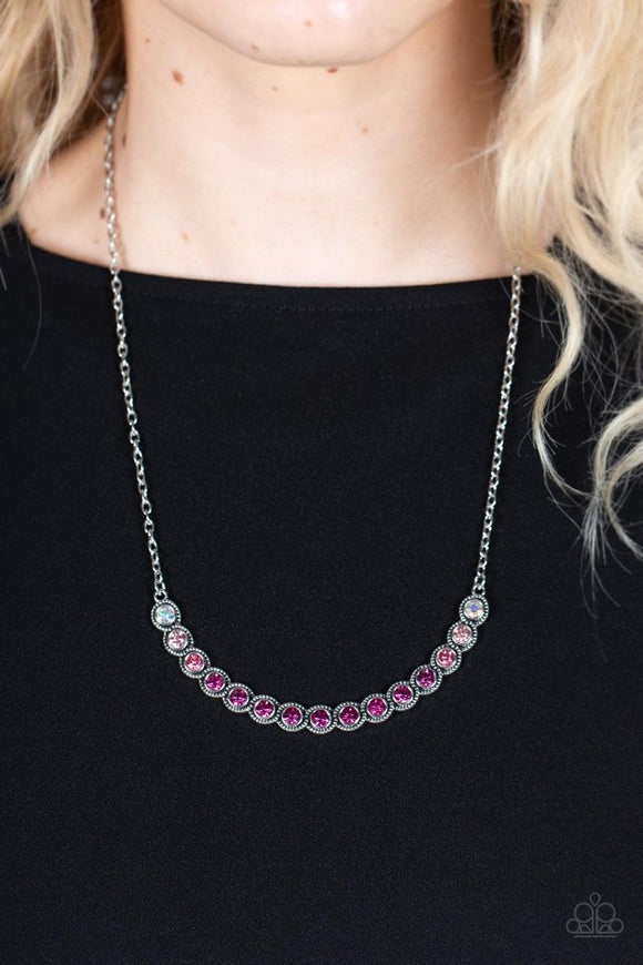 Paparazzi Throwing SHADES - Pink - Necklace  -  Encased in studded silver fittings, a glittery ombre of pink rhinestones delicately bows below the collar, creating an enchanting pop of color. Features an adjustable clasp closure.

