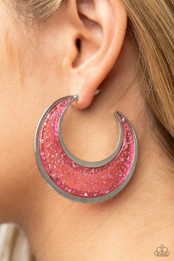 Paparazzi Charismatically Curvy - Pink - Earrings  -  Flecked in silver shavings, a glistening pink acrylic half moon frame is bordered with flat shiny bars that coalesce into a curvaceous hoop. Earring attaches to a standard post fitting. Hoop measures approximately 2