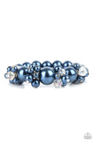 Paparazzi Upcycled Upscale - Blue - Set  -  Dainty blue pearls and sparkly white crystal-like beads cluster between oversized blue pearls that are threaded along stretchy bands around the wrist, creating a stunning centerpiece.
