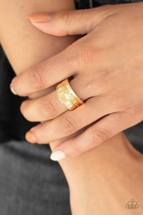 Paparazzi Band Together - Gold Ring - Brushed in a high-sheen finish, a rippling gold band arcs across the finger for a classic look. Features a dainty stretchy band for a flexible fit. 