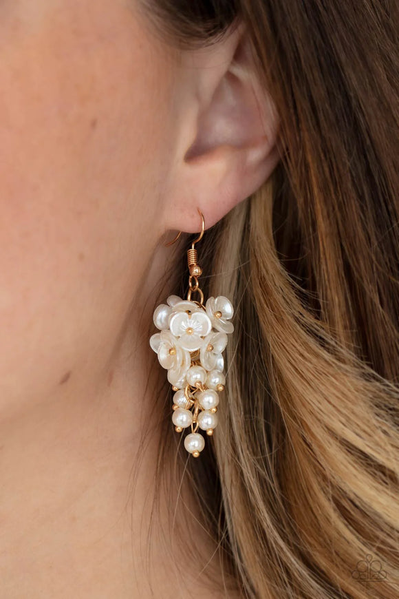 Paparazzi Bountiful Bouquets - Gold Earrings - A cluster of pearly white floral frames and dainty white pearls trickle from a gold chain, creating a romantic chandelier. Earring attaches to a standard fishhook fitting.
