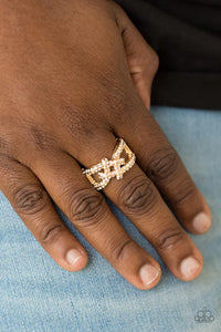 Paparazzi Can Only Go UPSCALE From Here - Gold Ring - Encrusted in glittery white rhinestones, shimmery gold bars crisscross across the finger, coalescing into a bold square knot atop the finger. Features a stretchy band for a flexible fit.