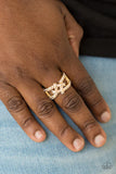 Paparazzi Can Only Go UPSCALE From Here - Gold Ring - Encrusted in glittery white rhinestones, shimmery gold bars crisscross across the finger, coalescing into a bold square knot atop the finger. Features a stretchy band for a flexible fit.