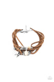 Paparazzi Canyon Flight - White Bracelet - Infused with a dainty silver bird charm, dainty strands of brown suede are adorned in mismatched silver accents and white stones for an earthy layered look. Features an adjustable clasp closure.
