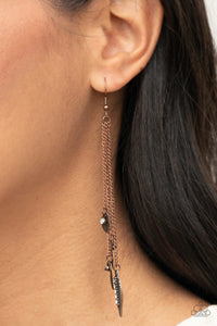 A collection of textured antiqued copper leaflets accented with dewdrop white rhinestones, swing from delicate copper chains creating a tranquil chime as it falls from the ear. Earring attaches to a standard fishhook fitting.