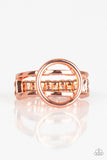 Paparazzi City Center Chic - Copper Ring - An airy shiny copper circle rests atop two arcing shiny copper bands, creating a bold minimalistic piece atop the finger. Features a dainty stretchy band for a flexible fit