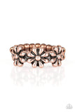 Paparazzi Daisy Dapper - Copper Ring - A row of dainty copper daisies connect across the finger, coalescing into a whimsical band. Features a dainty stretchy band for a flexible fit.