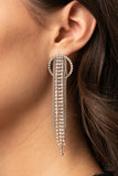 Paparazzi Dazzle By Default - White Earrings - Dainty strands of glassy white rhinestones and shimmery silver ball-chain stream from the top of a bedazzled white rhinestone hoop, creating a dazzling fringe. Earring attaches to a standard post fitting.