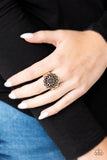 Paparazzi Desert Sunflower - Gold Ring - Embossed in a rustic wildflower pattern, a gold floral frame dots the top of the finger for a whimsical look. Features a stretchy band for a flexible fit.