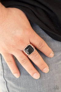 Paparazzi Don't Cross Me - Copper Ring - An oversized black square bead is pressed into the center of a thick copper band stamped in crisscrossing texture for an edgy look. Features a stretchy band for a flexible fit.