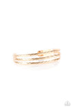Paparazzi Eastern Empire - Gold Bracelet - Etched in shimmery geometric patterns, glistening gold bars arc across the wrist, coalescing into a dainty cuff.