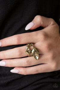 Paparazzi Flawless Foliage - Brass Ring - Aurum rhinestone encrusted frames, leafy brass frames, and golden topaz marquise style rhinestones bloom across the finger for a refined look. Features a stretchy band for a flexible fit.