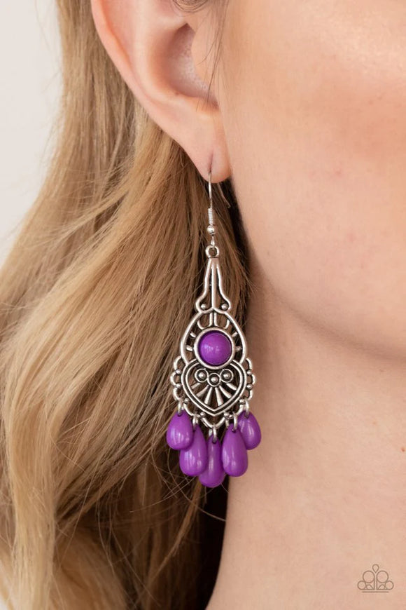 Paparazzi Fruity Tropics - Purple Earrings - Vivacious purple teardrop beads swings from the bottom of an ornately studded silver frame featuring a bubbly purple beaded center for a fruity finish. Earring attaches to a standard fishhook fitting. 