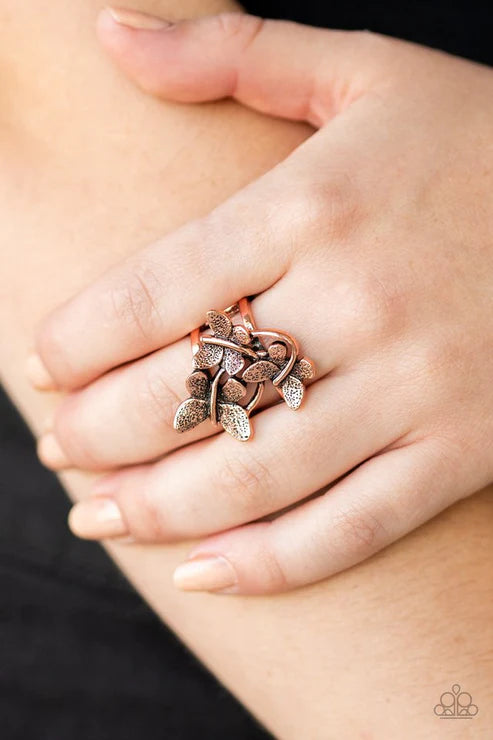 Paparazzi Full of Flutter - Copper Ring - A trio of fluttering copper butterflies rest atop the finger, coalescing into a whimsical centerpiece. Features a stretchy band for a flexible fit.