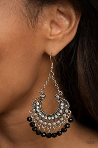 Paparazzi GLOW Down In Flames - Black Earrings - White rhinestone dotted petals fan out into a studded scalloped frame. Glittery black crystal-like beads swing from the bottom of the decorative silver frame, creating a glamorous fringe. Earring attaches to a standard fishhook fitting.