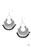 Paparazzi GLOW Down In Flames - Black Earrings - White rhinestone dotted petals fan out into a studded scalloped frame. Glittery black crystal-like beads swing from the bottom of the decorative silver frame, creating a glamorous fringe. Earring attaches to a standard fishhook fitting.