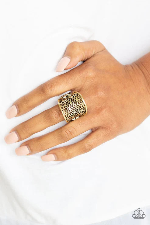 Paparazzi Garden Safari - Brass Ring - Stenciled in an airy floral pattern, a thick brass band curls around the finger for a whimsical springtime look. Features a stretchy band for a flexible fit.