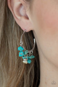 Paparazzi Gorgeously Grounding - Blue Earrings - Clusters of turquoise pebbles swing from the bottom of a dainty silver hoop, creating an earthy fringe. A faceted silver and white stone bead swings from the center, adding an ethereal edge. Earring attaches to a standard post fitting. Hoop measures approximately 1 1/4" in diameter.