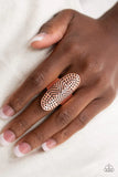 Paparazzi Guru Grunge - Copper Ring - Engraved in an antiqued geometric patterns, a thick copper band overlaps a hammered oval frame, coalescing into a rustic centerpiece atop the finger. Features a stretchy band for a flexible fit.