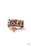 Paparazzi Heartstring Harmony - Copper Ring - Brushed in an antiqued shimmer, a glistening copper ribbon spells out the word, "love," atop a copper band dotted with a dainty copper heart center for a romantically rustic look. Features a stretchy band for a flexible fit.