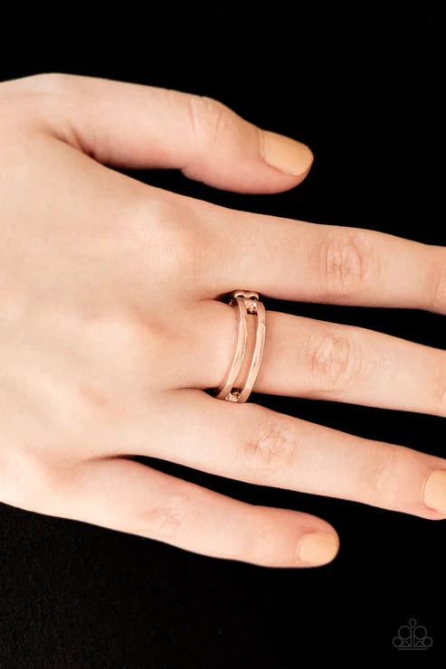 Paparazzi I Need Space - Rose Gold Ring - Glistening rose gold bands arc across the finger, joining into an airy band for a casual look. Features a dainty stretchy band for a flexible fit.
