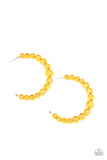Paparazzi In The Clear - Orange Earrings - Gradually increasing in size at the center, a glassy collection of Marigold beads are threaded along an oversized hoop for a bubbly effect. Earring attaches to a stand post fitting. Hoop measures approximately 2 1/2" in diameter.