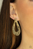Paparazzi Industrial Antiquity - Brass Earrings - The bottom of a warped brass teardrop frame is hammered in rustic details, creating a tactile display. Earring attaches to a standard post fitting.