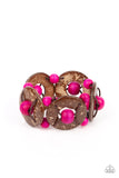 Paparazzi Island Adventure - Pink Bracelet - An oversized collection of pink wooden beads and distressed brown wooden discs are threaded along stretchy bands that decoratively weave around the wrist for a summery flair.