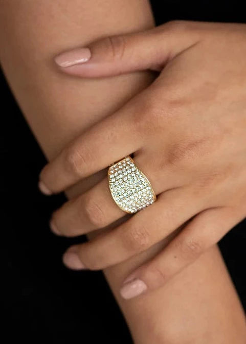 Paparazzi Kaboom! - Gold Ring - Countless white rhinestones are encrusted along a thick gold band for a spellbinding look. Features a stretchy band for a flexible fit.