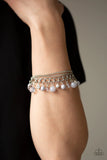 Paparazzi Let me SEA - Silver Bracelet - Infused with layers of mismatched silver chains, glassy, polished gray, and glittery white rhinestones swing from the wrist in a whimsical fashion. Features an adjustable clasp closure.