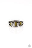 Paparazzi Noble Nova - Black Gunmetal - Ring - Three green emerald-cut rhinestones are encrusted along three gunmetal bands radiating with smooth surfaces and sections of glittery hematite rhinestones for an edgy fashion. Features a stretchy band for a flexible fit.