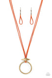 Paparazzi Noticeably Nomad - Orange - Necklace  Flanked by dainty brass rings, a marquise shaped brass bead glides along lengthened strands of rustic orange suede, holding in place an oversized brass ring at the bottom for an artisan inspired fashion. Features an adjustable clasp closure.  Sold as one individual necklace. Includes one pair of matching earrings.