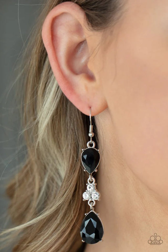 Paparazzi Once Upon A Twinkle - Black Earrings - A trio of dazzling white rhinestones unites two jet black teardrop gems as they dangle brilliantly from the ear for a flawless finish. Earring attaches to a standard fishhook fitting.