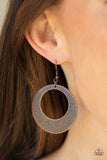 Paparazzi Outer Plains - Copper - Earrings - Brushed in an antiqued shimmer, a round copper frame is scratched in a gritty linear pattern for a rustic fashion. Earring attaches to a standard fishhook fitting.