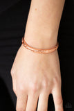 Paparazzi Precisely Petite - Copper Bracelet - Shiny copper filigree vines across the front of dainty copper frames that are threaded along stretchy bands around the wrist for a seasonal look.