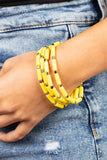 Paparazzi Radiantly Retro - Yellow Bracelet - A playful collection of dainty silver cube beads and cylindrical Illuminating beads are threaded along stretchy bands, creating colorful layers around the wrist.