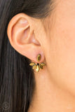 Paparazzi Radical Refinement - Brass Earrings - A solitaire aurum marquise cut rhinestone attaches to a double-sided post, designed to fasten behind the ear. Encrusted in matching aurum rhinestones, a double-sided post peeks out beneath the ear, creating a glittery fringe. Earring attaches to a standard post fitting.