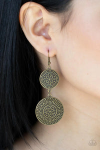 Paparazzi Road Trip Paradise - Brass Earrings - Embossed in floral filigree, two round brass frames delicately link into a rustic lure for a whimsy fashion. Earring attaches to a standard fishhook fitting.