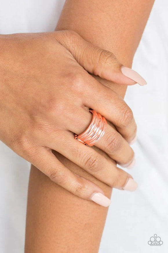 Paparazzi Rough Around The Edges - Copper Ring - Brushed in a high-sheen finish, ribbed shiny copper bands stack across the finger for an edgy industrial look. Features a stretchy band for a flexible fit.