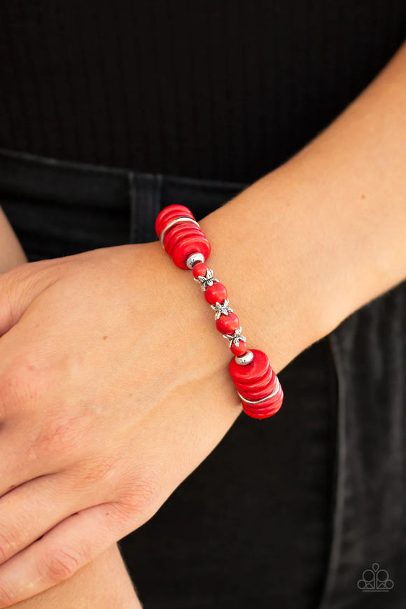 Paparazzi Sagebrush Serenade - Red Bracelet - Featuring glistening silver accents, disc-shaped and round red stone beads are threaded along a stretchy band for a seasonal look.