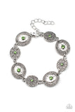 Paparazzi Secret Garden Glamour - Green Bracelet - Delicate Peridot rhinestones dot the centers of engraved antiqued silver discs. The dotted textures and heart shaped vines create a charming impression as they gracefully link around the wrist. Features an adjustable clasp closure.