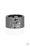 Paparazzi Self-Made Man - Black Gunmetal Ring - A thick gunmetal band has been hammered in shimmery detail for a metro inspired look. Features a stretchy band for a flexible fit.