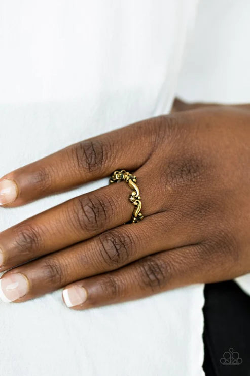 Paparazzi Serenely Summer - Brass Ring - Floral brass filigree dances across the finger, creating a dainty band. Features a dainty stretchy band for a flexible fit.