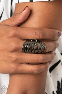 Paparazzi Sound Waves - Black Gunmetal Ring - Delicately hammered gunmetal bands ripple across the finger, stacking into a boldly layered look with an edgy industrial finish. Features a stretchy band for a flexible fit.