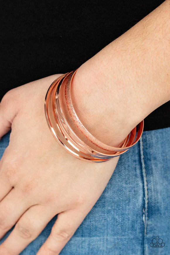 Paparazzi Stackable Style - Copper Bracelet - Varying in hammered, textured, and high sheen finishes, a mismatched collection of shiny copper bangles stacks across the wrist for a classic fashion.