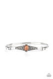 Paparazzi Stone Scrolls - Brown Bracelet - Dotted with an oval brown stone, an antiqued silver frame is embossed with a vine-like scroll that hooks to a dainty cuff-like bangle, creating a whimsical centerpiece.