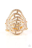 Paparazzi Stratospheric - Gold Ring - Countless dazzling peach rhinestones are sprinkled along swooping gold bands, creating a glamorous frame atop the finger. Features a stretchy band for a flexible fit.