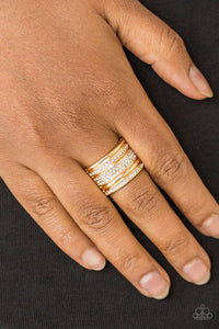Paparazzi Top Dollar Drama - Gold Ring - Shimmery gold and white rhinestone encrusted bands stack across the finger for a glamorous look. Features a stretchy band for a flexible fit.