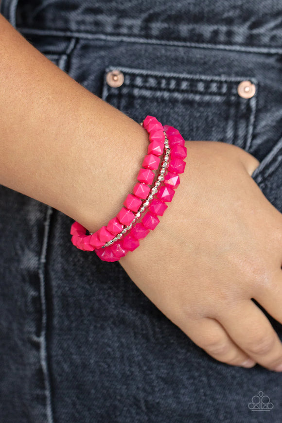 Paparazzi Vacay Vagabond - Pink Bracelet - Infused with a strand of round and faceted silver beads, faceted rows of solid and opaque pink cube beads are threaded along stretchy bands, wrapping around the wrist for a vivacious pop of color.